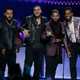 Image for article titled Glitter, Glam, and Bad Bunny's Acrylic Fingernails Ruled the Billboard Latin Music Awards